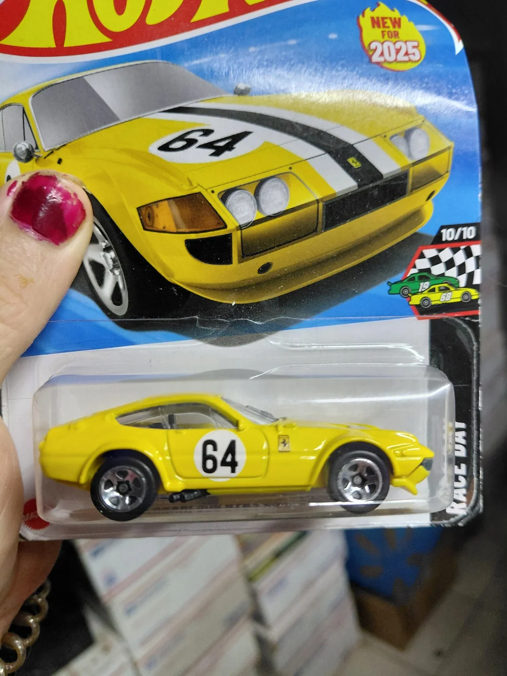 yellow Hot Wheels Ferrari 365 GTB4 Competizione is a 1:64 scale diecast vehicle